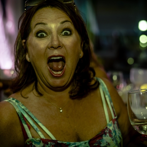 A lady amazed at a wedding party